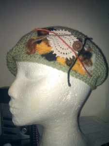 Crocheted hat with embellishment